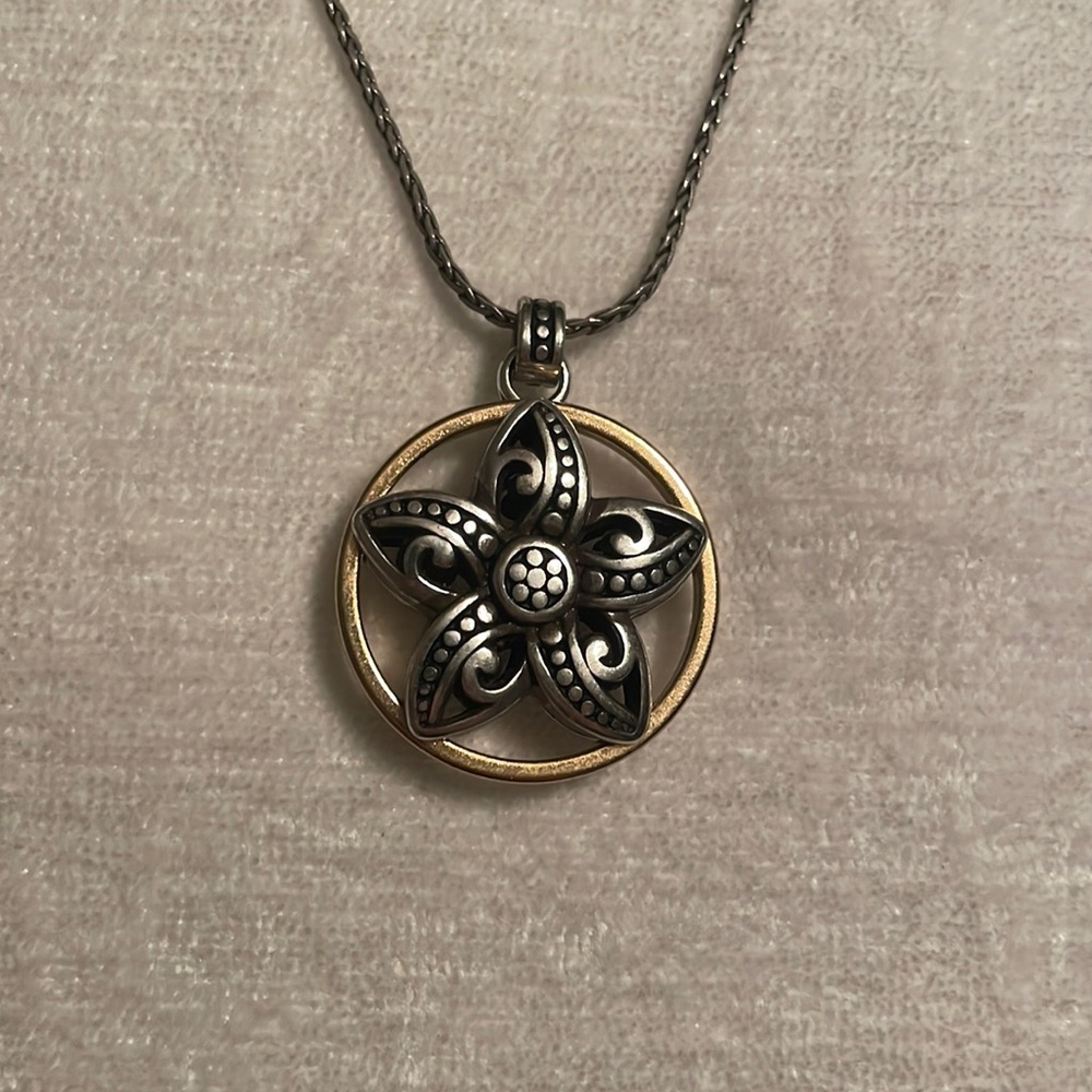 Silver Brighton necklace with gold trim reversible pendant. Size 20”-18”.